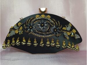 Black and gold bridal clutch bag with handmade bead embroidery, floral crystal design and dangling embellishments