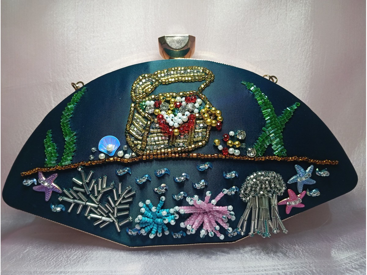 Teal ocean themed clutch for women with hand embroidered seashell, starfish and coral bead design