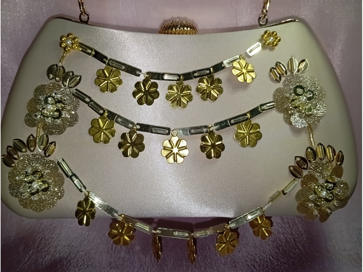 Beige fancy clutch for women with gold floral embroidery and hanging embellishments