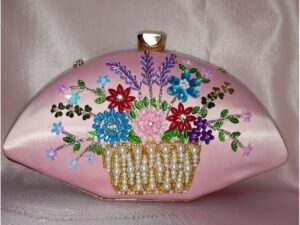 Pink fancy clutch for women with multicolor floral embroidery and pearl basket detailing