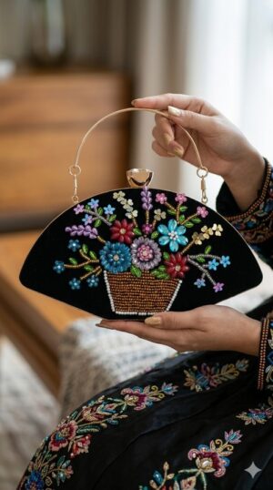 black multi floral embellished clutch by clutchrose