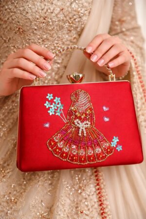 red clutch for hijabi bride by clutchrose