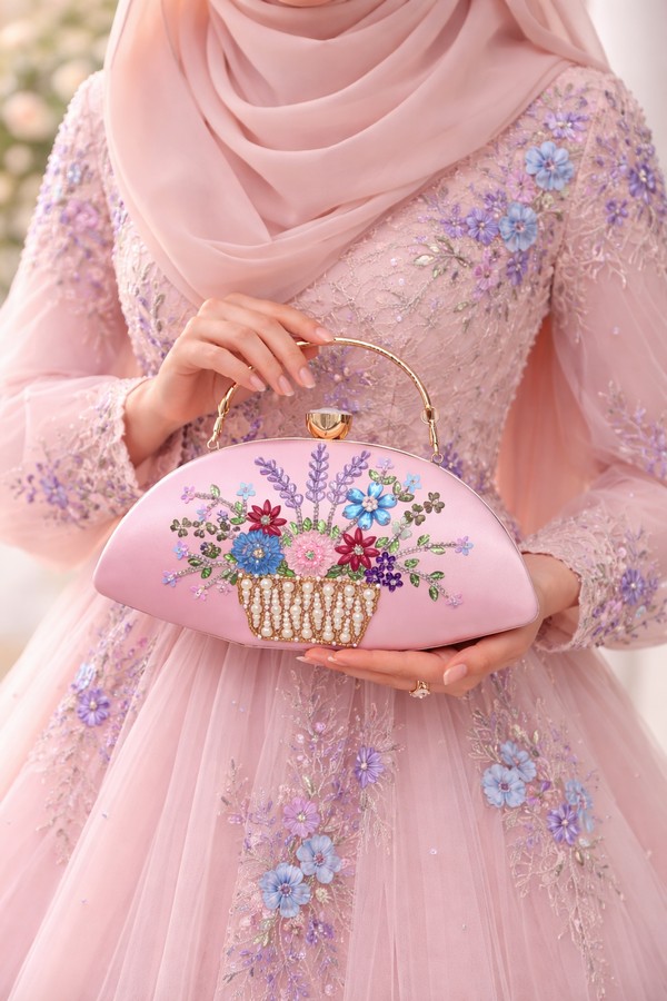 pink embroidered clutch
