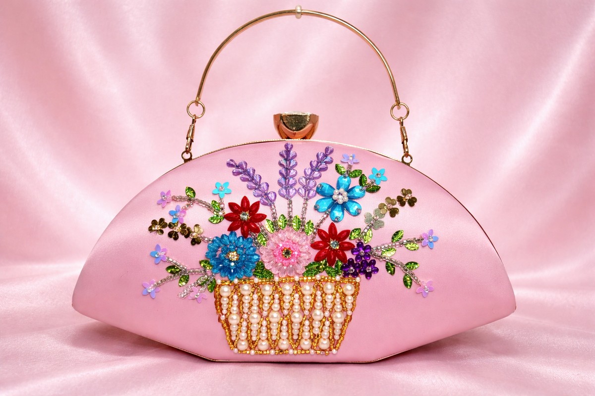 pink embroidered fancy party clutch by clutchrose