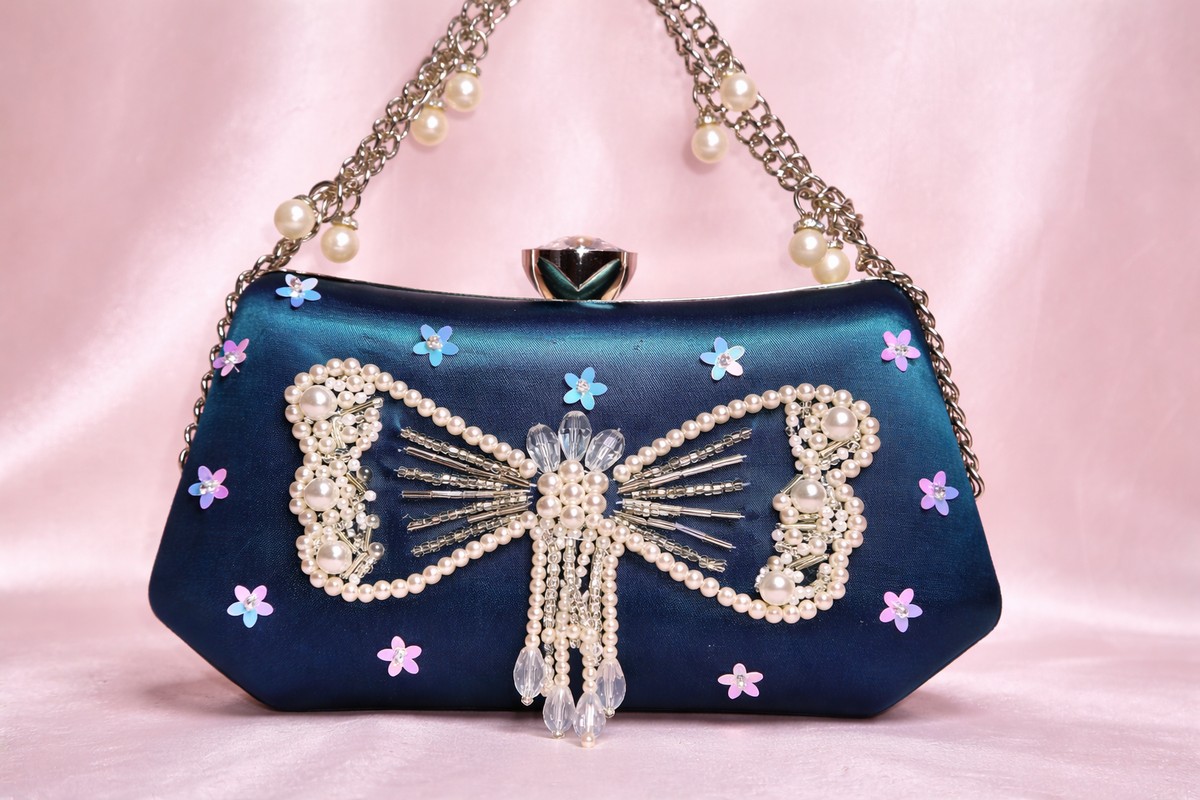 teal silver bow fancy embroidered clutch